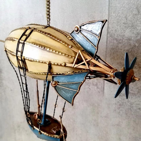 Side view of steampunk retro European-style airship handcrafted metal model back view