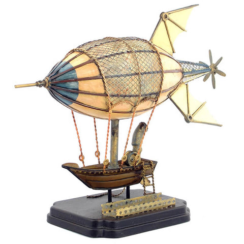 Airship handcrafted metal model placed on a desk