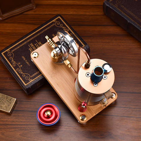 Steam engine model placed diagonally on a book