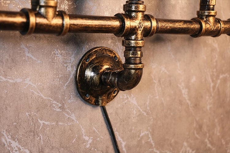 Close-up of pipe wall light details