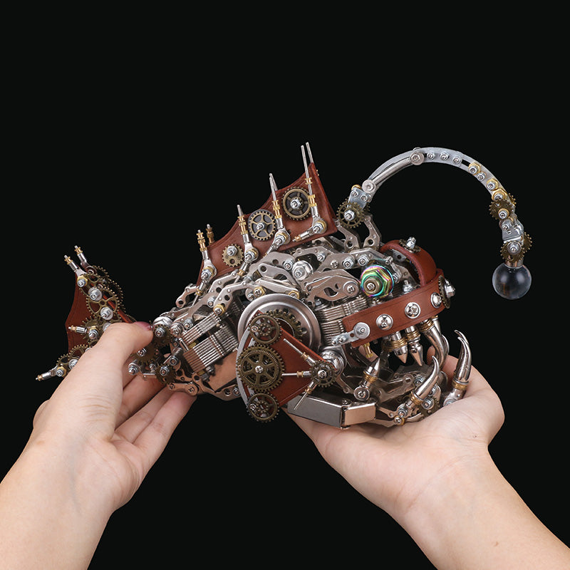 hands-holding-steampunk-anglerfish-size-reference